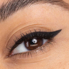 Honeybee Gardens Effortless Eye Liner Pencil Jet Set Black tip closeup shows smooth application.