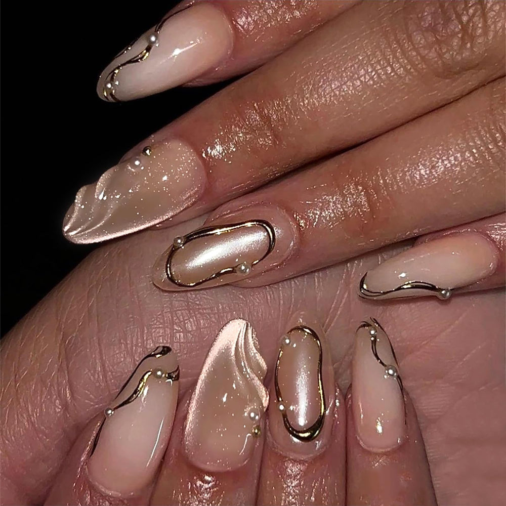 HOSAILY 3D gold press-on nails in nude cat-eye set showing gradient shimmer for everyday style