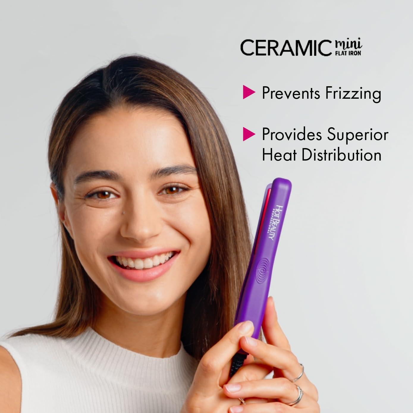 Hot Beauty Mini Flat Iron pink side profile emphasizes compact design