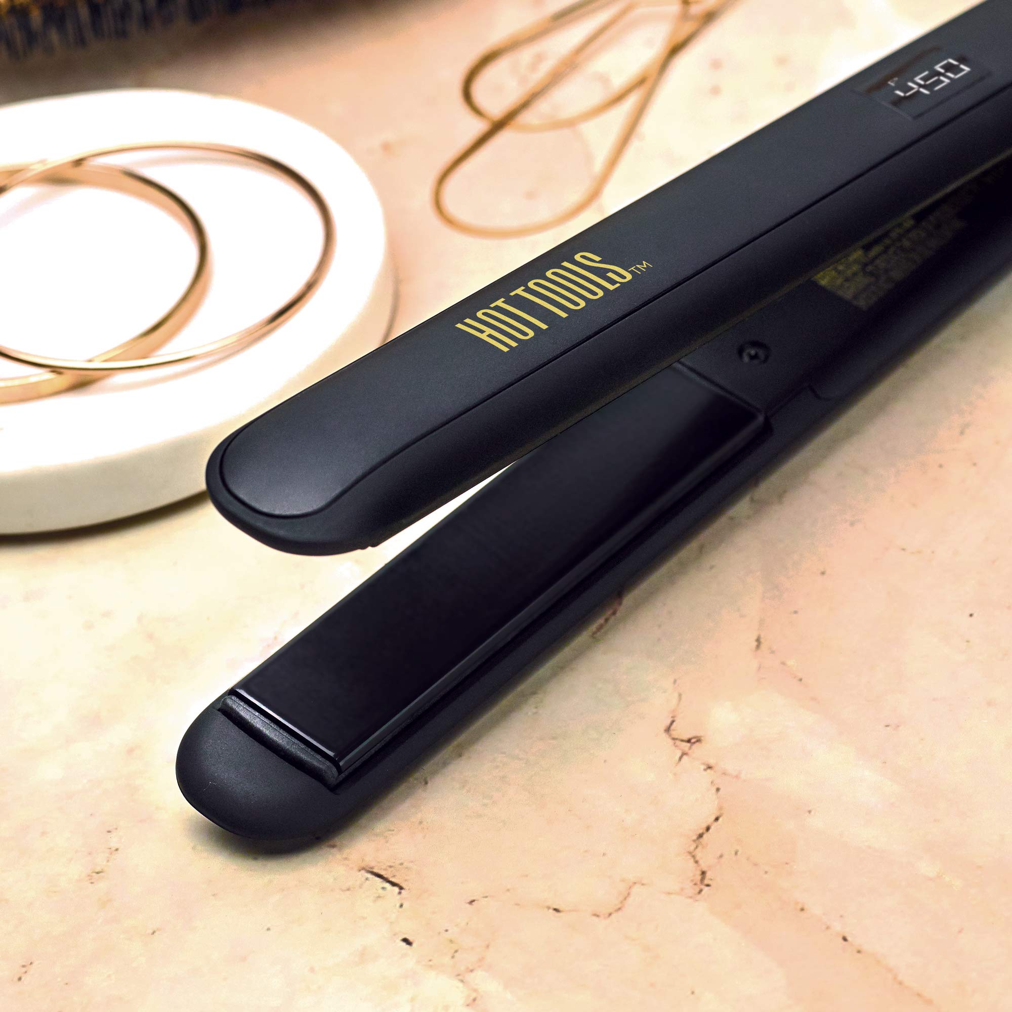 Hot Tools Pro Signature flat iron floating plates for seamless glide across hair