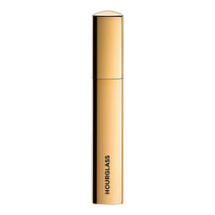 Hourglass Caution Extreme Lash Mascara bottle highlights volumizing potential for dramatic lashes.