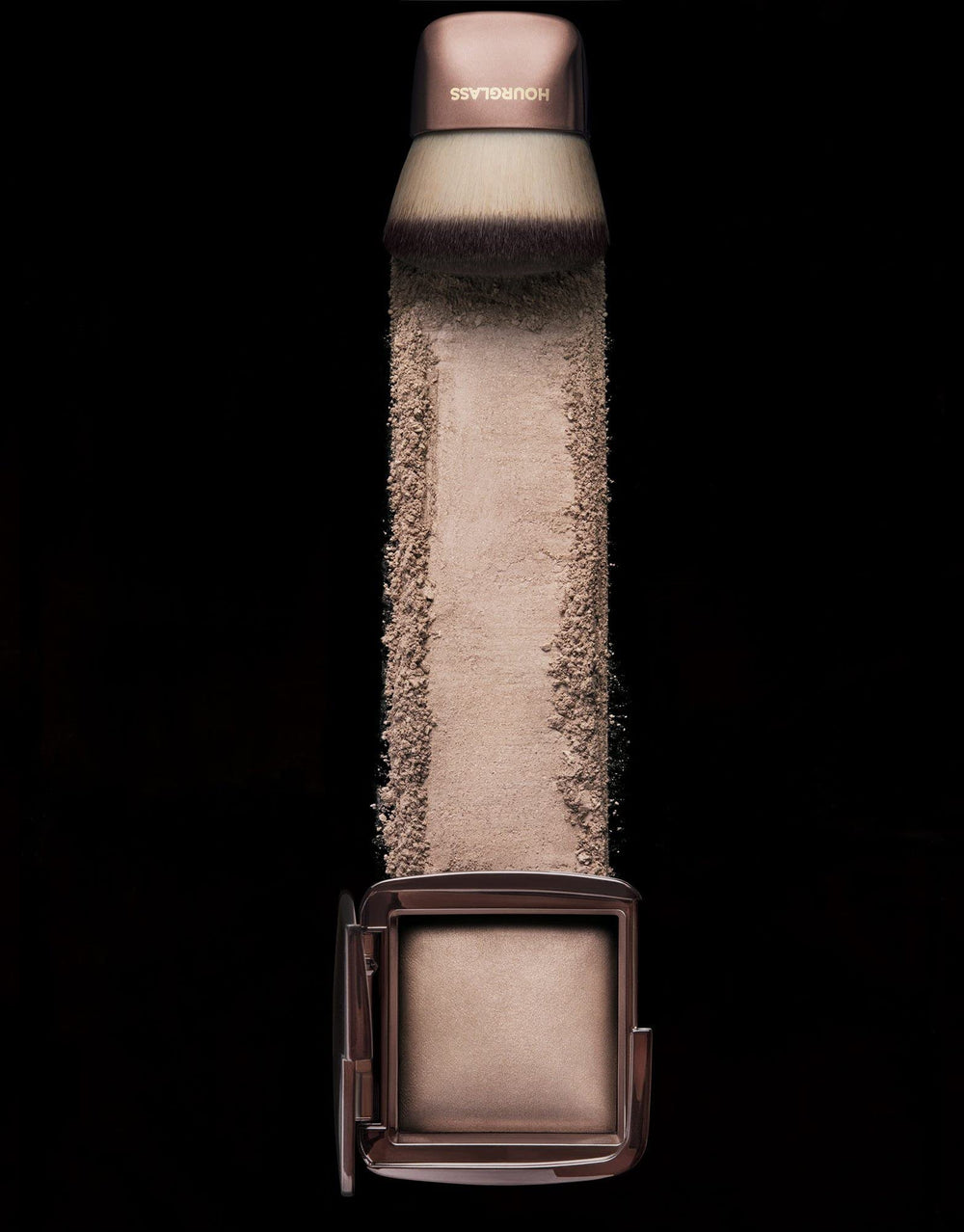Hourglass Mini Dim Light application swatch highlights universal shade for flattering light.