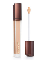 Hourglass Vanish Airbrush Concealer bottle with applicator delivers weightless coverage for seamless skin.