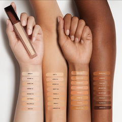 Hourglass Vanish Airbrush Concealer microspherical powders blur texture for smooth skin.
