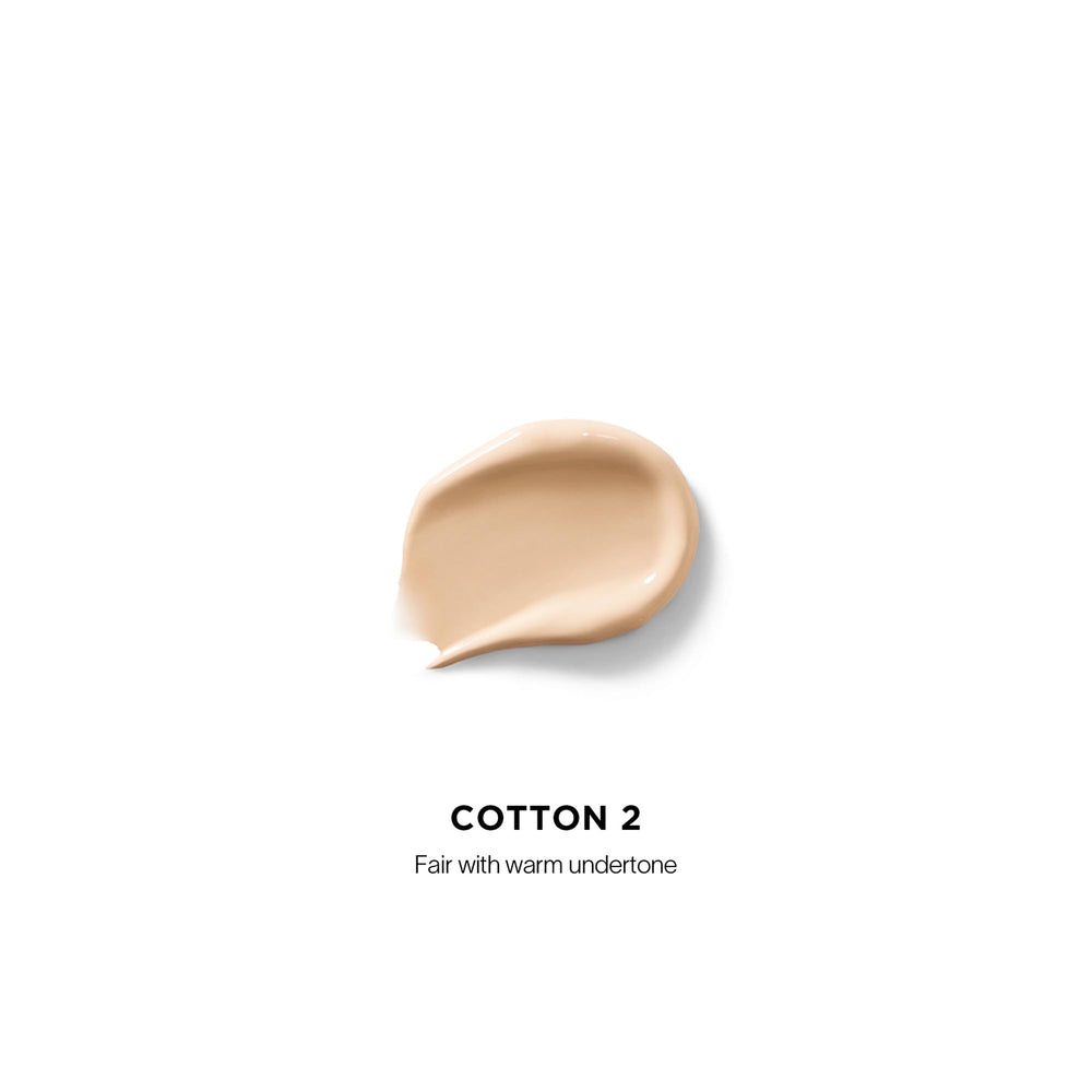 Hourglass Vanish Airbrush Concealer swirled texture shows creamy formula delivering natural full-coverage