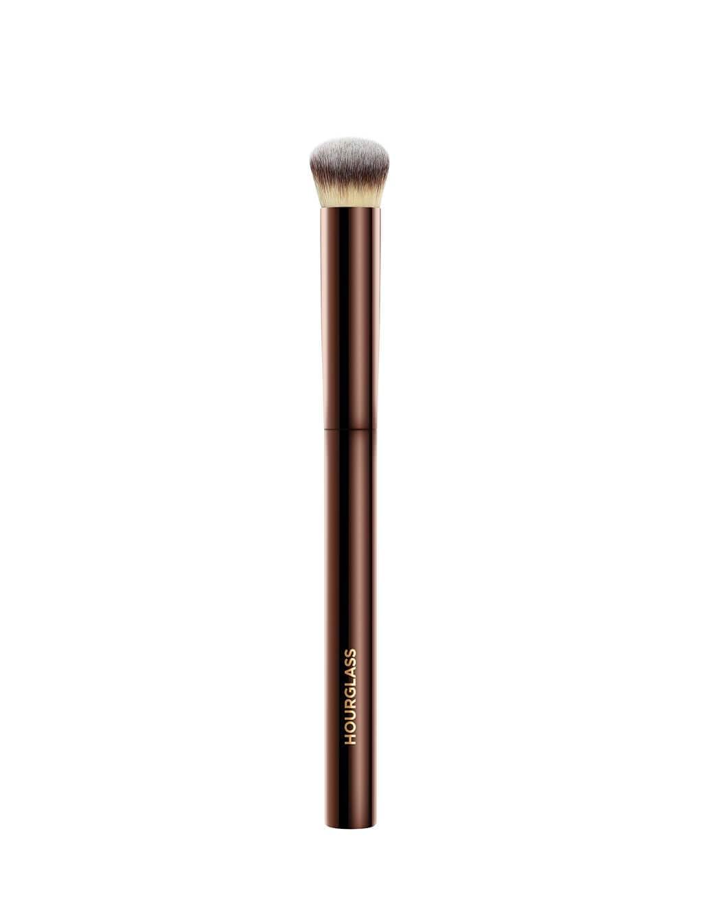 Hourglass Vanish Concealer Brush close-up showing precise, seamless blending for a flawless finish.