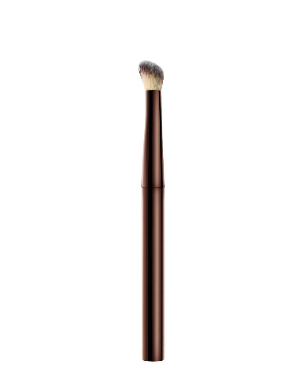 Hourglass Vanish Concealer Brush handle detail highlights weighted metal grip for pro-level control.