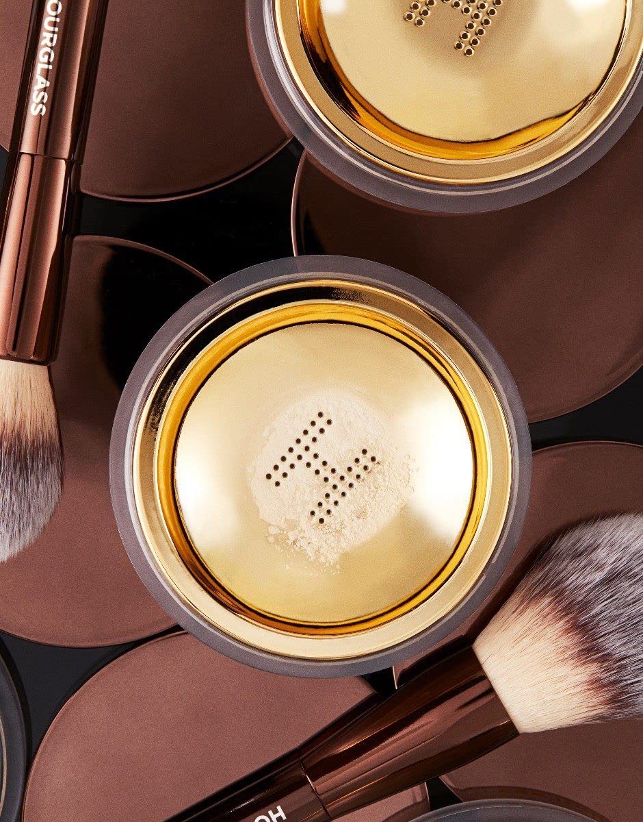 Hourglass Veil Translucent Setting Powder application on finger shows long-wear, crease-free base.