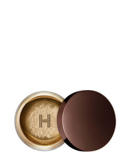 Hourglass Veil Translucent Setting Powder cap demonstrates mess-free packaging for precise application.