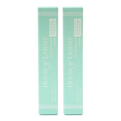 House of Lashes glue-dark-adhesive-tube closeup shows latex-free formula for sensitive eyes.
