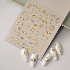 HPYFOI Gold Evil Eye Nail Sticker embossed detail for realistic texture on nails.