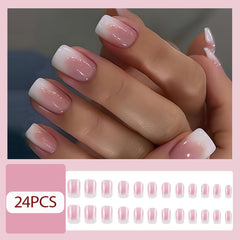 Hrnsnails pink-to-white ombre nails closeup highlighting glossy finish