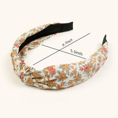Huachi knotted headband with elastic fit stays secure all day