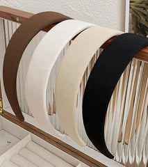 Huachi classic black faux-leather headband adds chic style with comfortable grip.