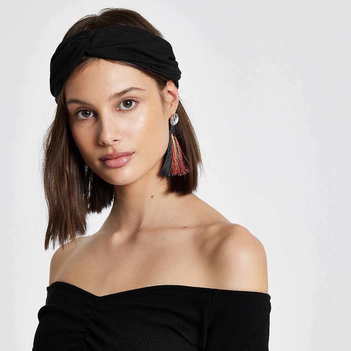 Huachi headbands in soft knit material provide gentle non slip grip during workouts