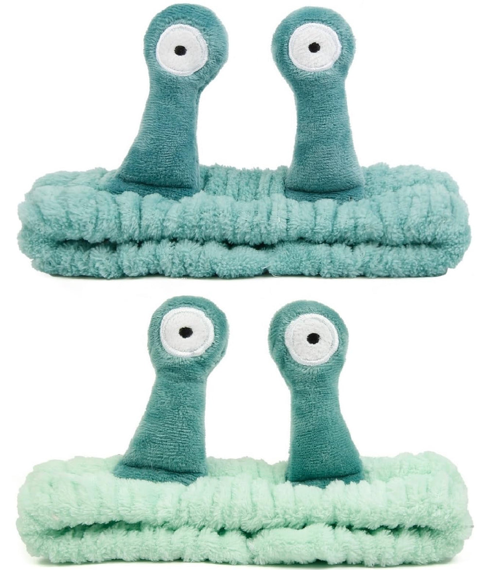 Huachi snail spa headband washing face with cute wiggle tentacles for mess-free skincare.