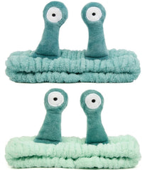 Huachi snail spa headband washing face with cute wiggle tentacles for mess-free skincare.