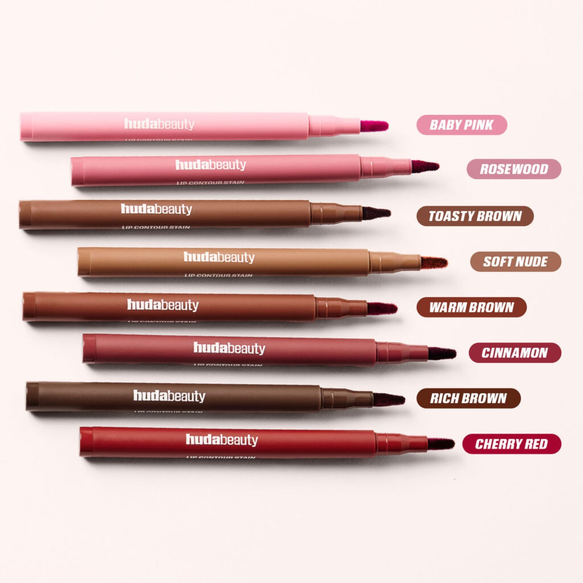 Huda Lip Contour Stain Warm Brown product shot with packaging