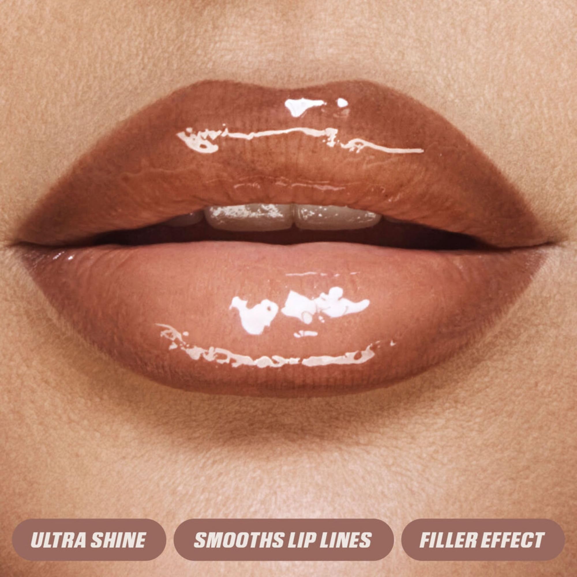 Huda Pink Kit closeup shows high-shine glossy lip finish.