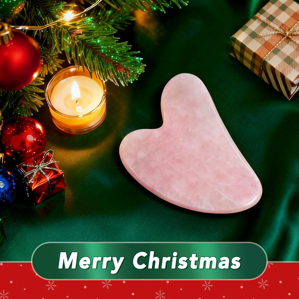 huefull Gua Sha rose quartz close-up highlighting natural stone varieties and smooth finish