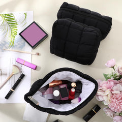 Huhumy Puffy bag side profile, compact yet roomy for makeup and brushes.