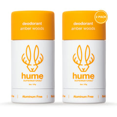HUME SUPERNATURAL Amber Woods deodorant stick close-up showing aluminum-free formula for fresh underarms.
