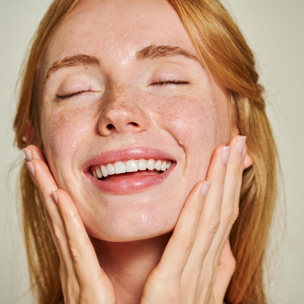 Humphreys rose-water drop on skin for refreshed look.
