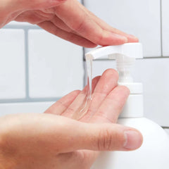 Huron shampoo argan oil drop visual implies nourishment for hair and scalp.