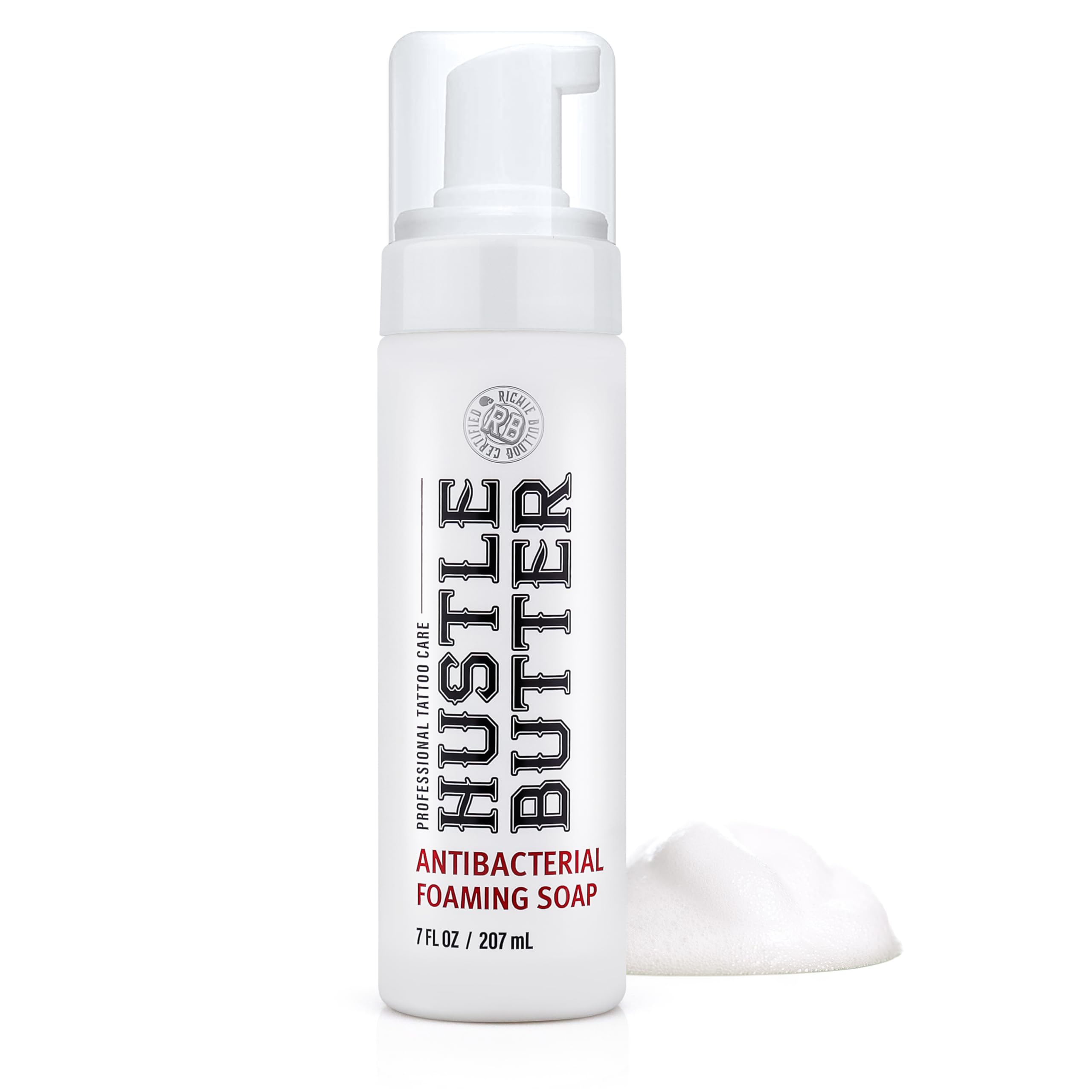 Hustle Bubbles tattoo aftercare soap bottle demonstrates gentle cleansing for new tattoos.
