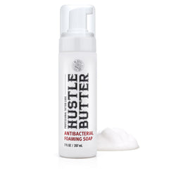 Hustle Bubbles tattoo aftercare soap bottle demonstrates gentle cleansing for new tattoos.