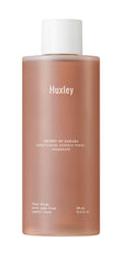 Huxley Conditioning Essence Toner bottle with cactus oil promotes calm, hydrated skin.