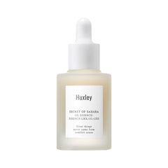 Huxley Secret of Sahara Oil Essence bottle close-up highlighting hydration and glow.