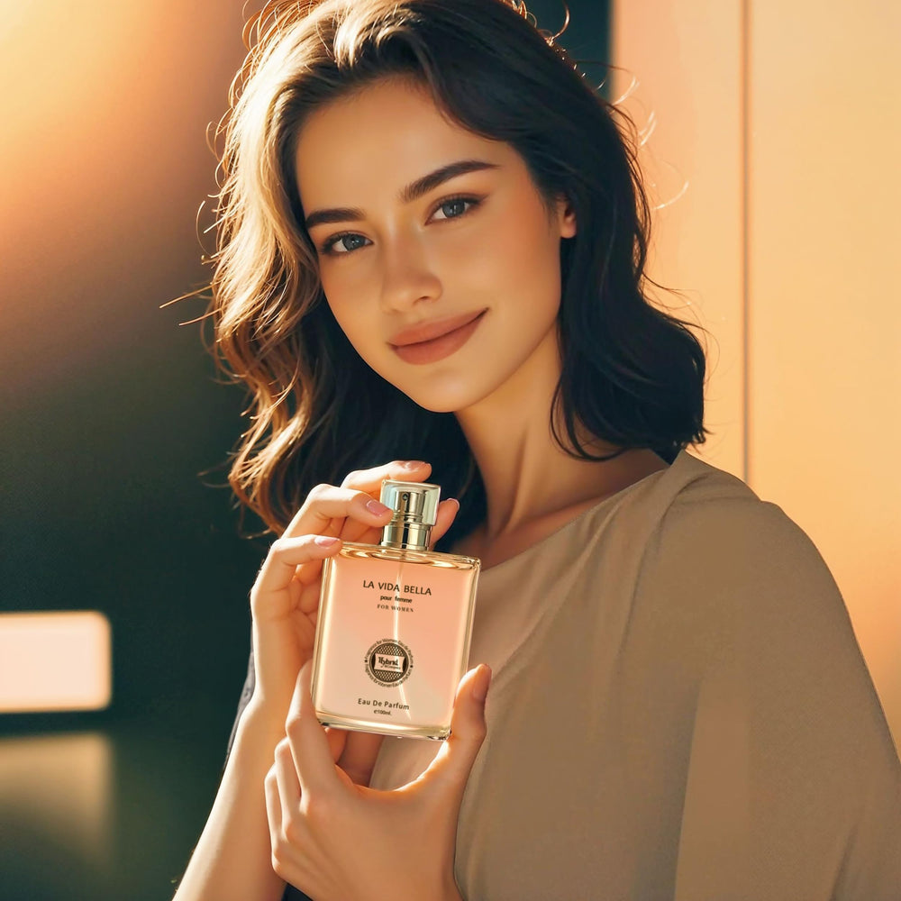 Hybrid & Company La Vida Bella spray mist captured mid-application for smooth, even distribution.