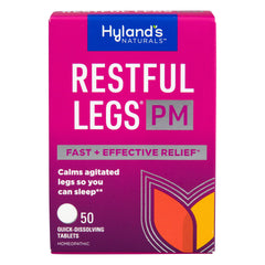 Hyland's Restful Legs PM bottle on nightstand promotes calm legs at night.