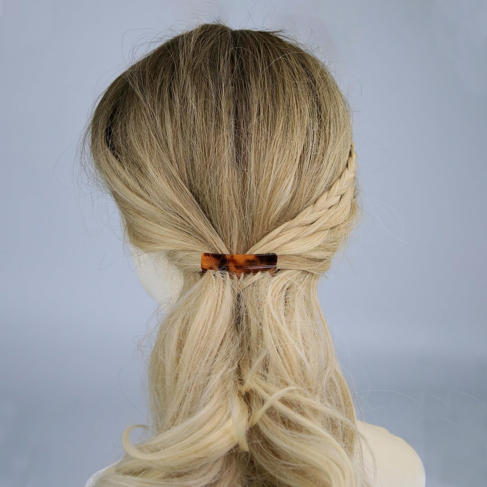 IAXSEE color-coordinated brown, black, and light brown combs laid out as a cohesive accessory set