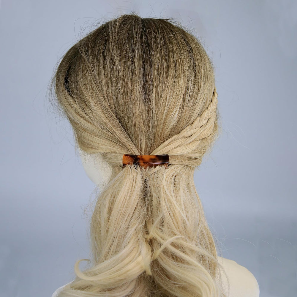 IAXSEE color-coordinated brown, black, and light brown combs laid out as a cohesive accessory set