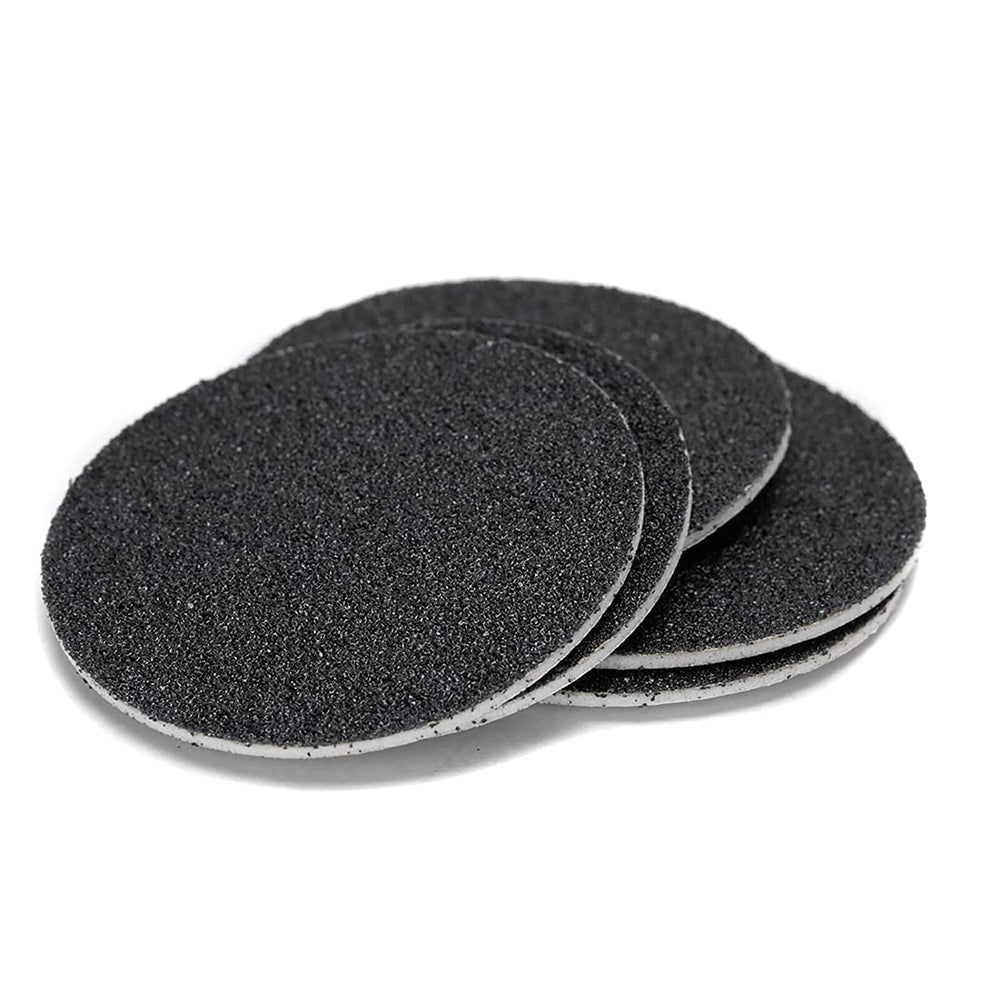 I·B·N G adhesive backing close up on disc