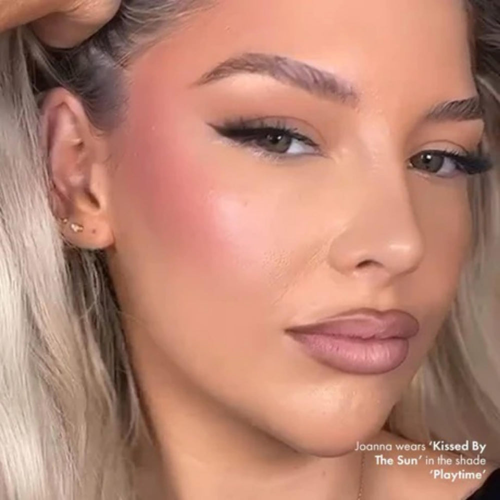 Iconic London Kissed by the Sun topper on cheeks for radiant finish