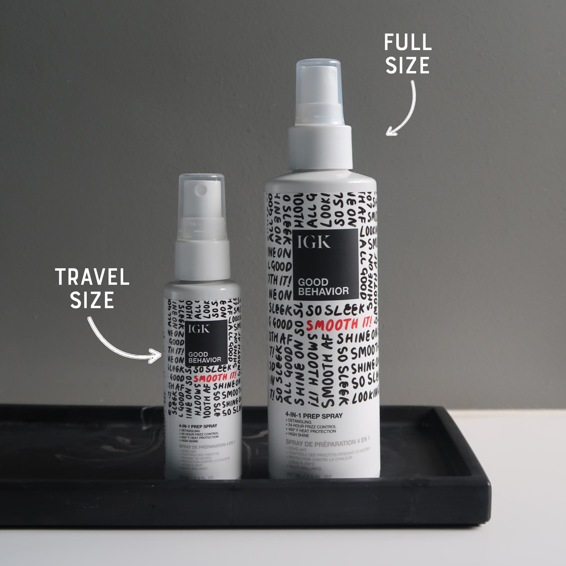 IGK Good Behavior bottle close-up demonstrates even spray for smooth application.