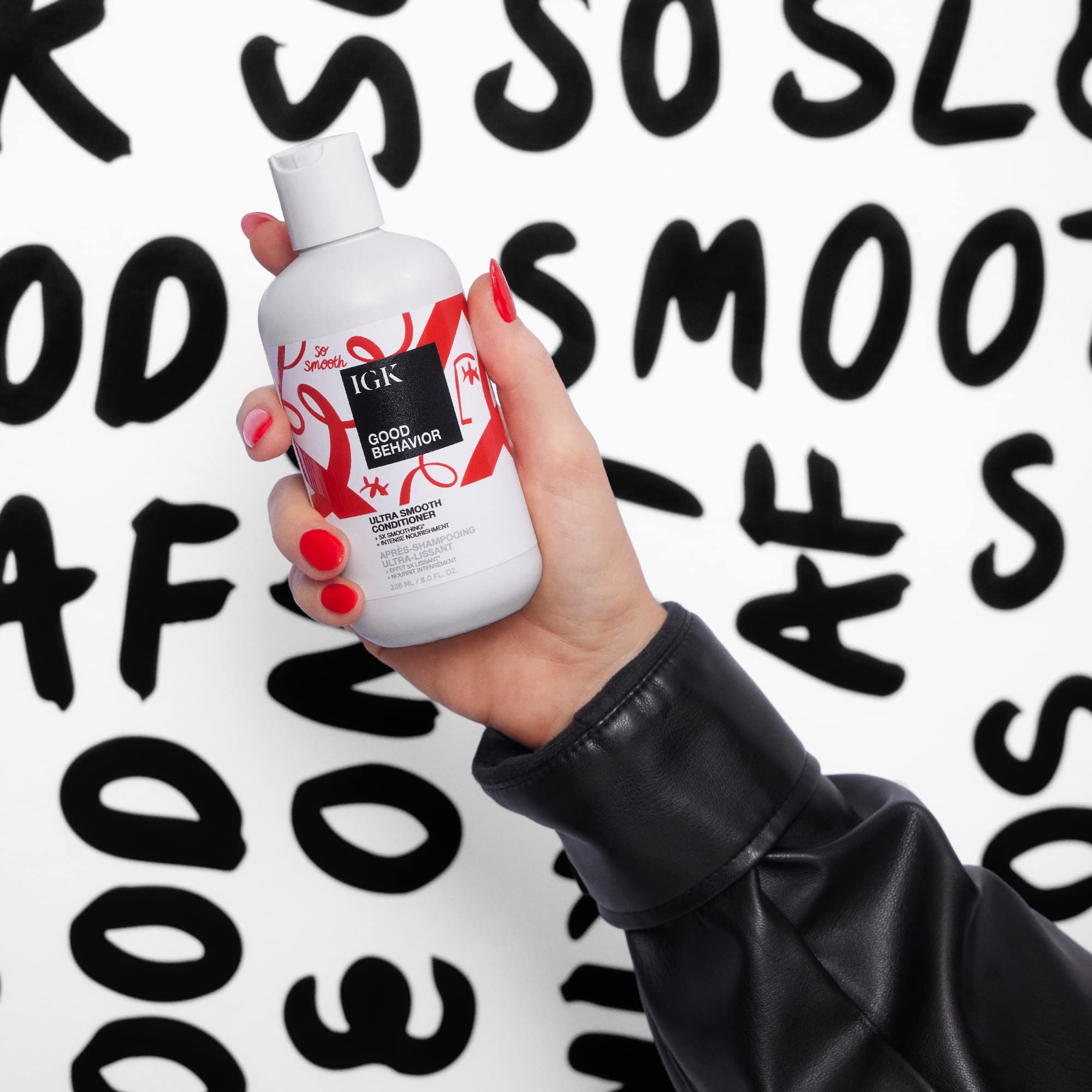 IGK Good Behavior bottle pump demonstrates easy application for nourished strands