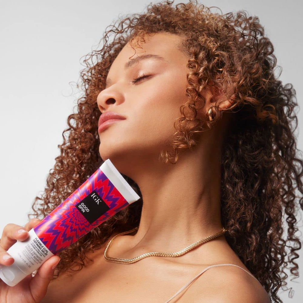 IGK GOOD SPIN smooth curls closeup hints flexible hold without crunch.