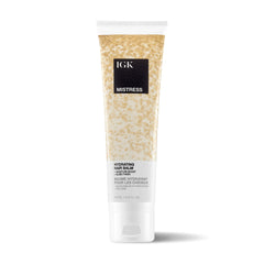 IGK MISTRESS hydrating hair balm bottle for lightweight hydration and frizz control.
