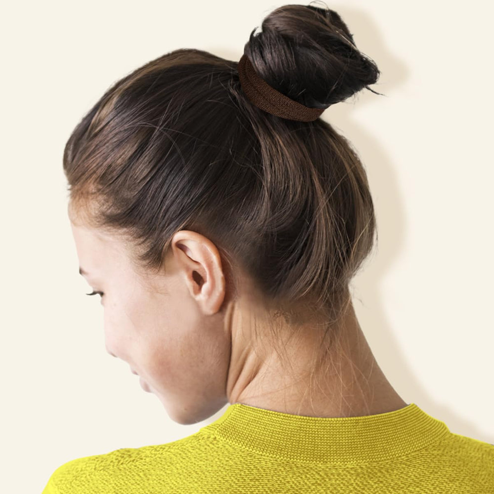 IKOCO hair ties used to secure a ponytail and bun for active days.