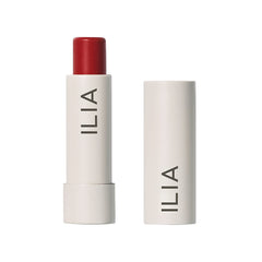ILIA Balmy Tint Hydrating Lip Balm Heartbeats swatch provides warm red color with nourished lips