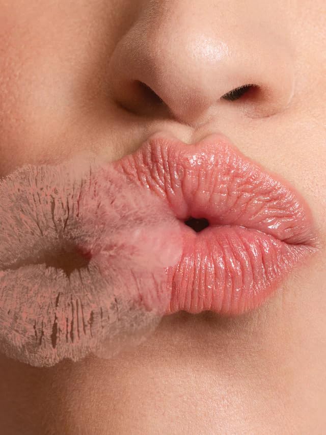 ILIA Balmy Tint Hold Me lip swatch on lips, showcasing a versatile peachy nude shade.