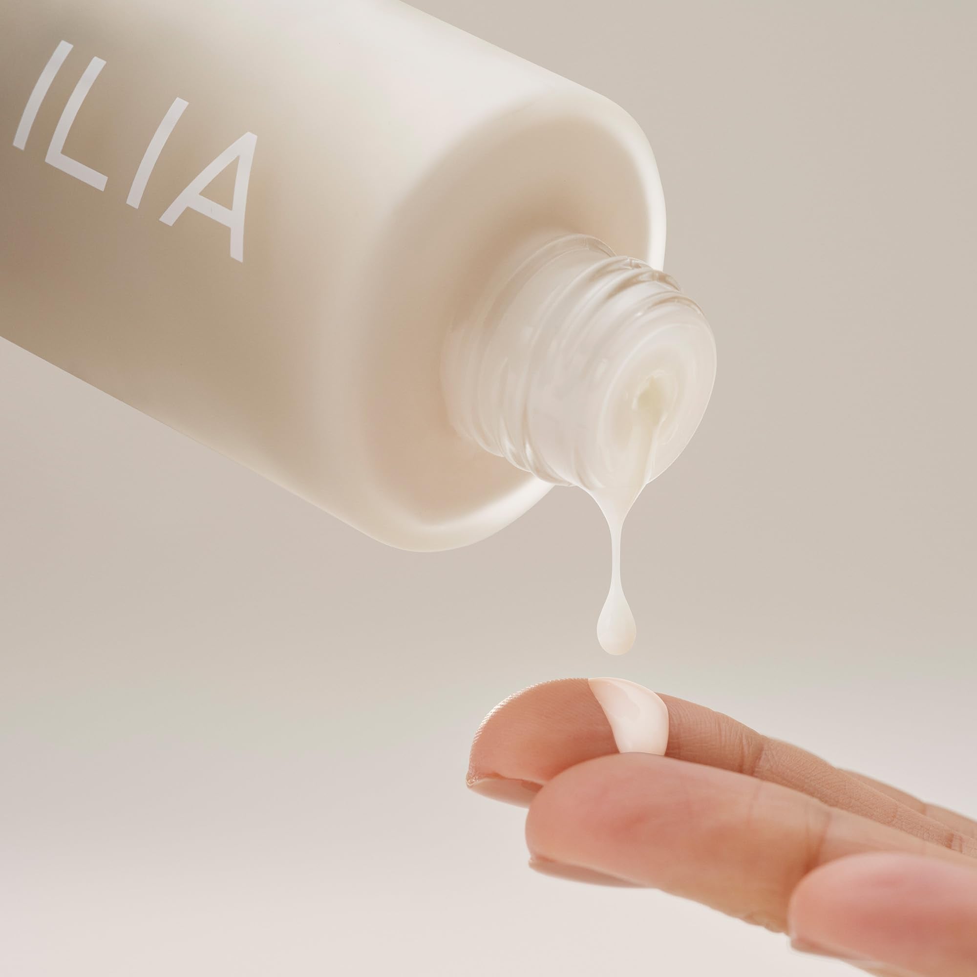 ILIA The Base Face Milk packaging-sustainability shot highlights eco-conscious packaging