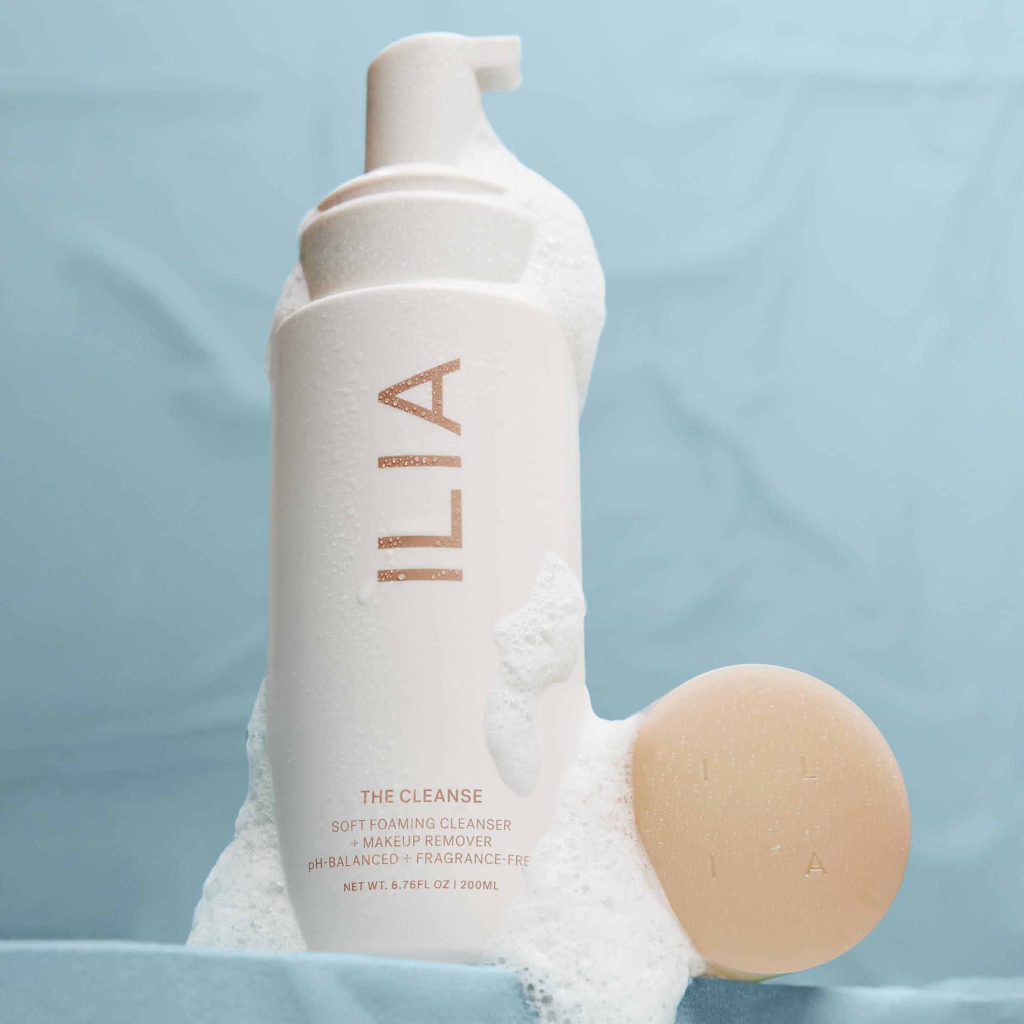 ILIA The Cleanse makeup-remover in action highlights fragrance-free, gentle cleansing.
