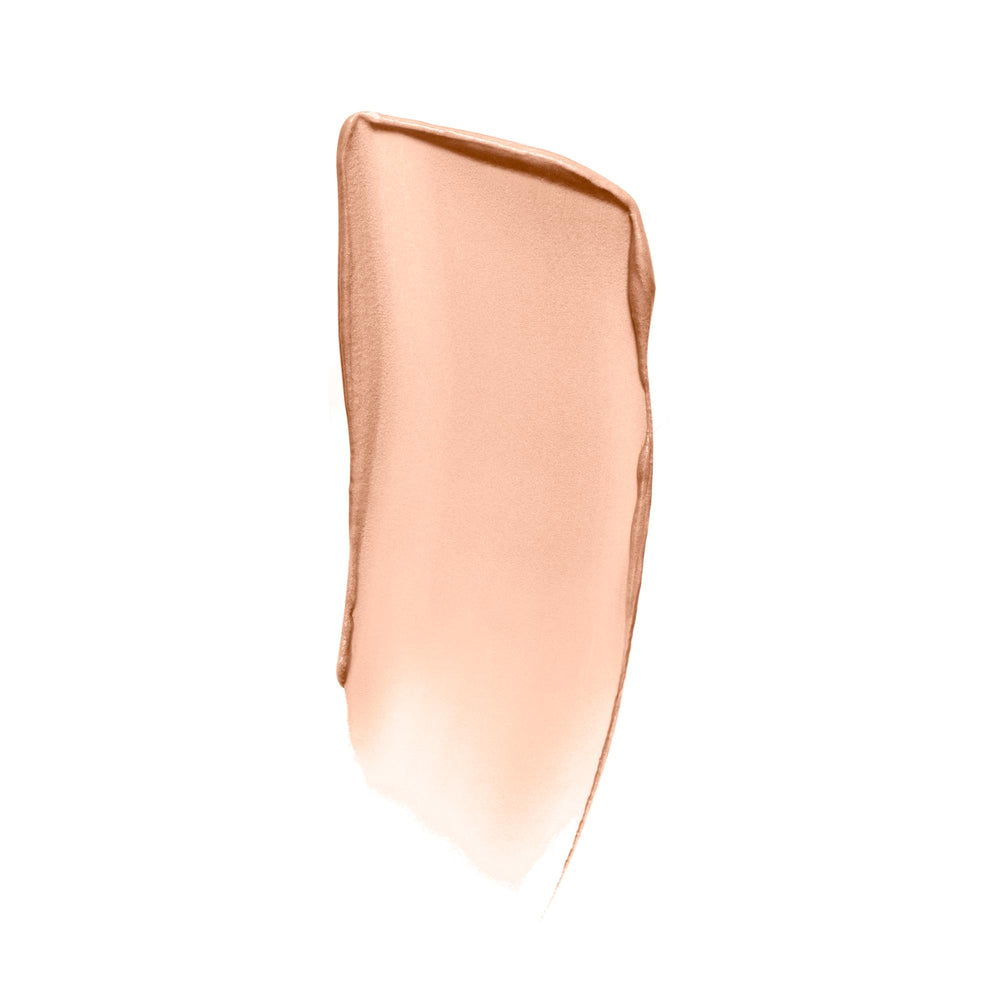 ILIA Lightshift Cream Highlighter swatch on cheekbone showing natural radiance.