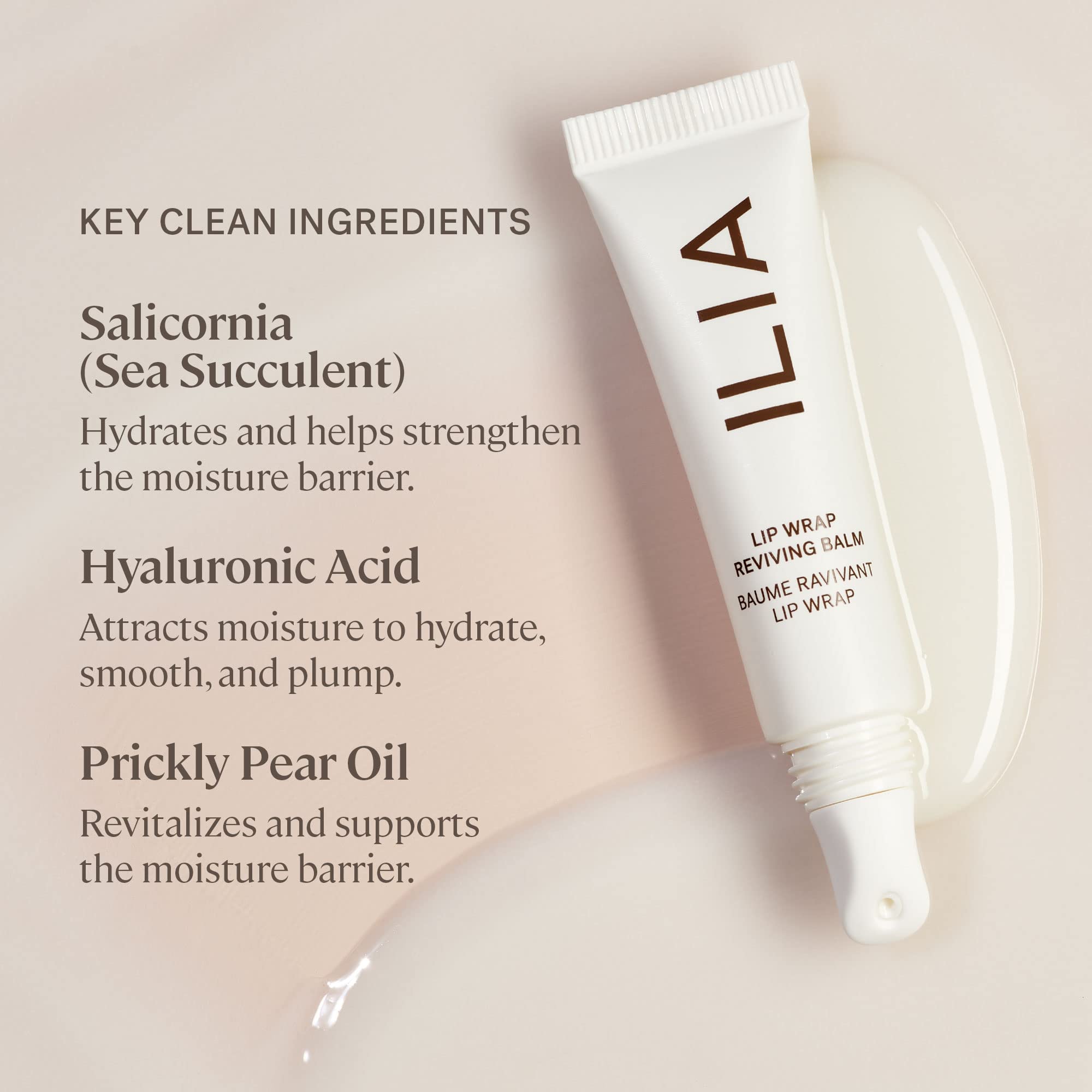 ILIA Lip Wrap Reviving Balm with glass-like sheen on fingertips