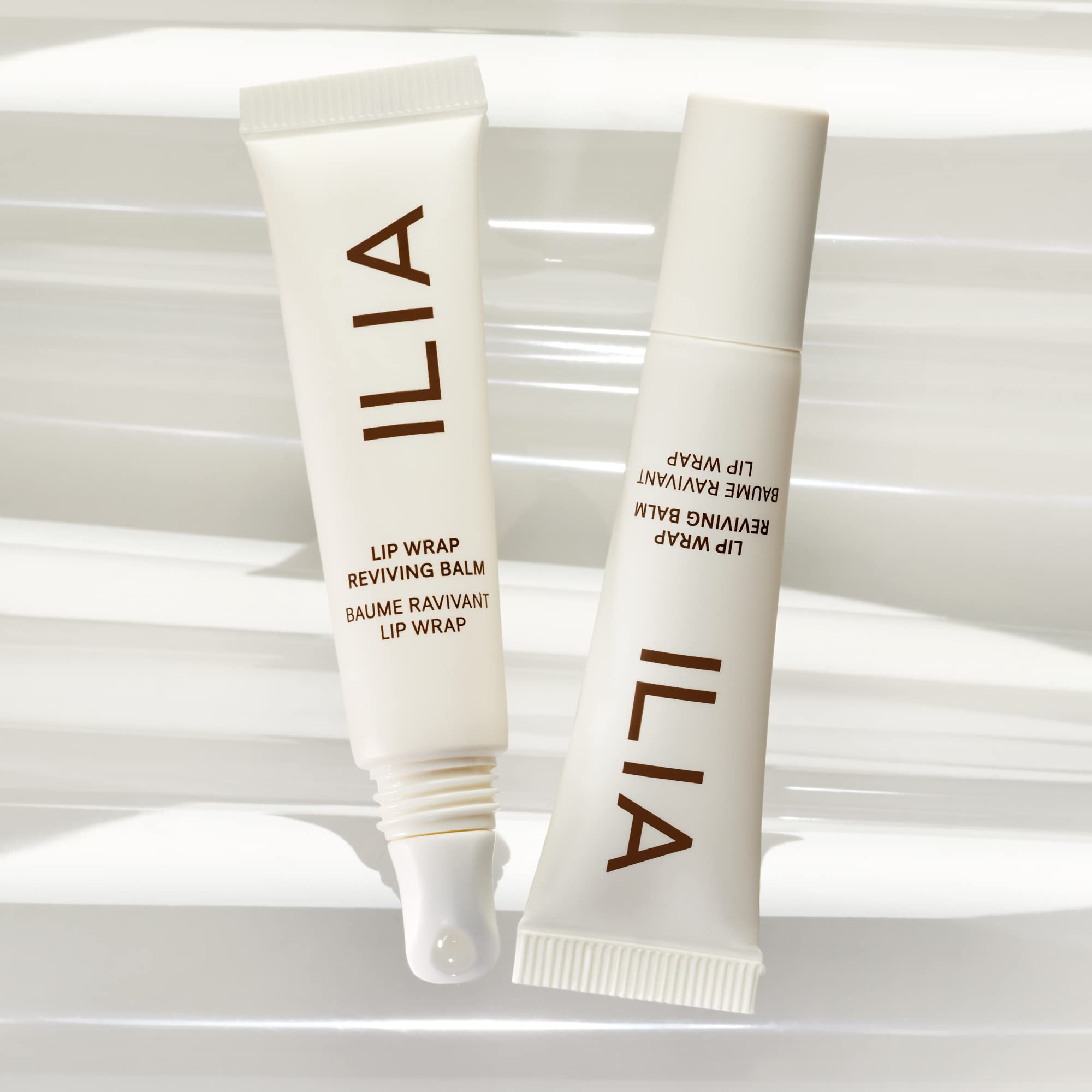 ILIA Lip Wrap Reviving Balm swatch showing satin sheen and hydration
